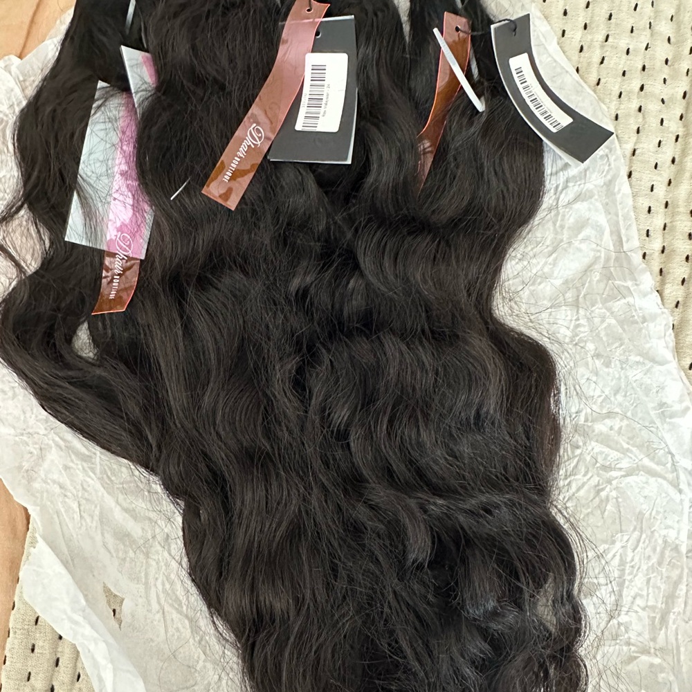 4 bundles of raw Malaysian wavy from Dhairboutique